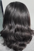 Blowdried_Black_Head_Of_Wavy_Hair