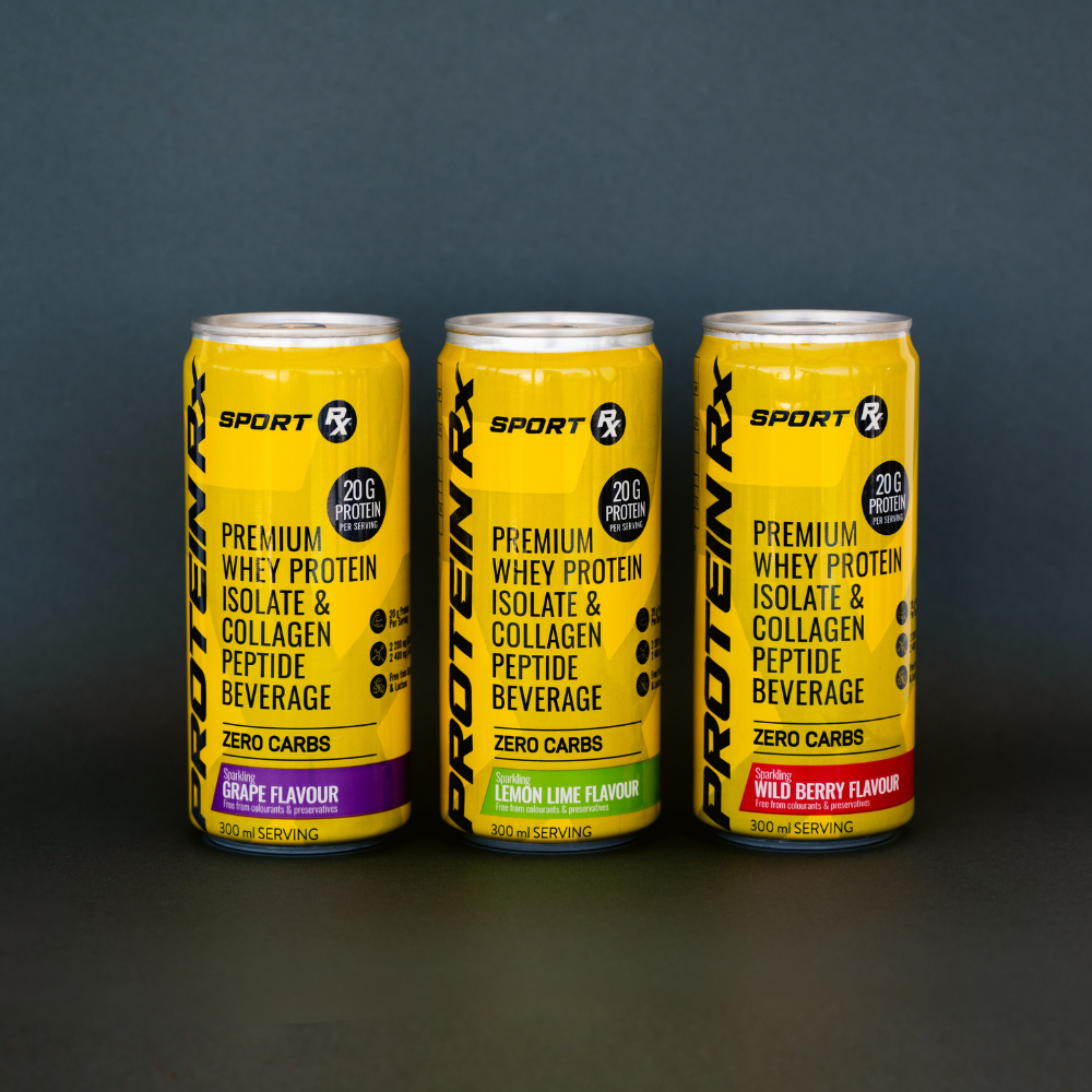 Three cans of Protein Rx Sport protein beverages on a dark background